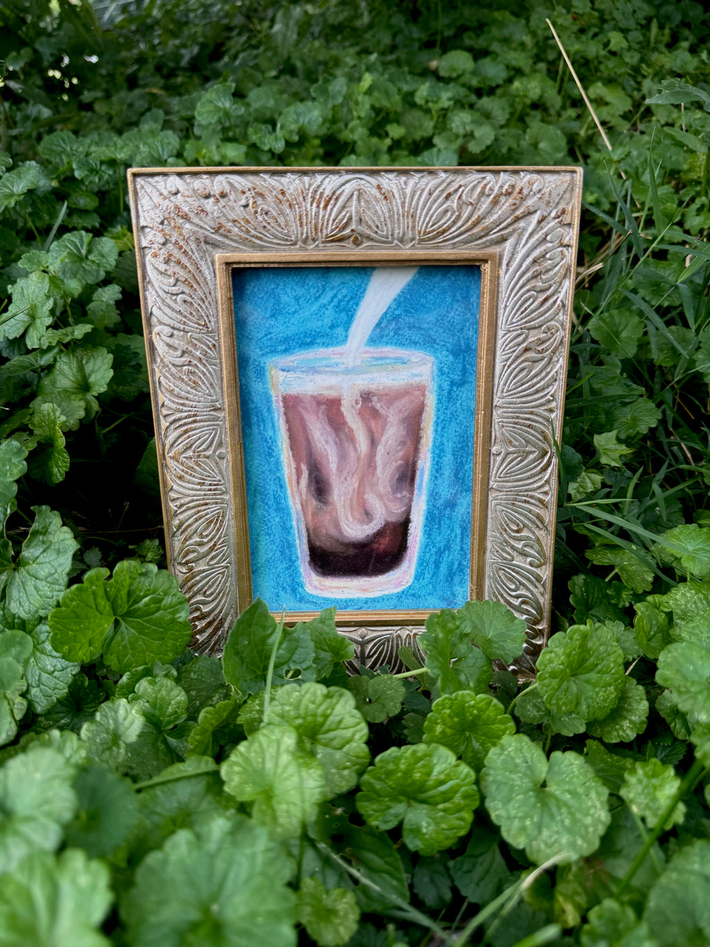 Framed iced coffee oil pastel print displayed on wall – gallery art