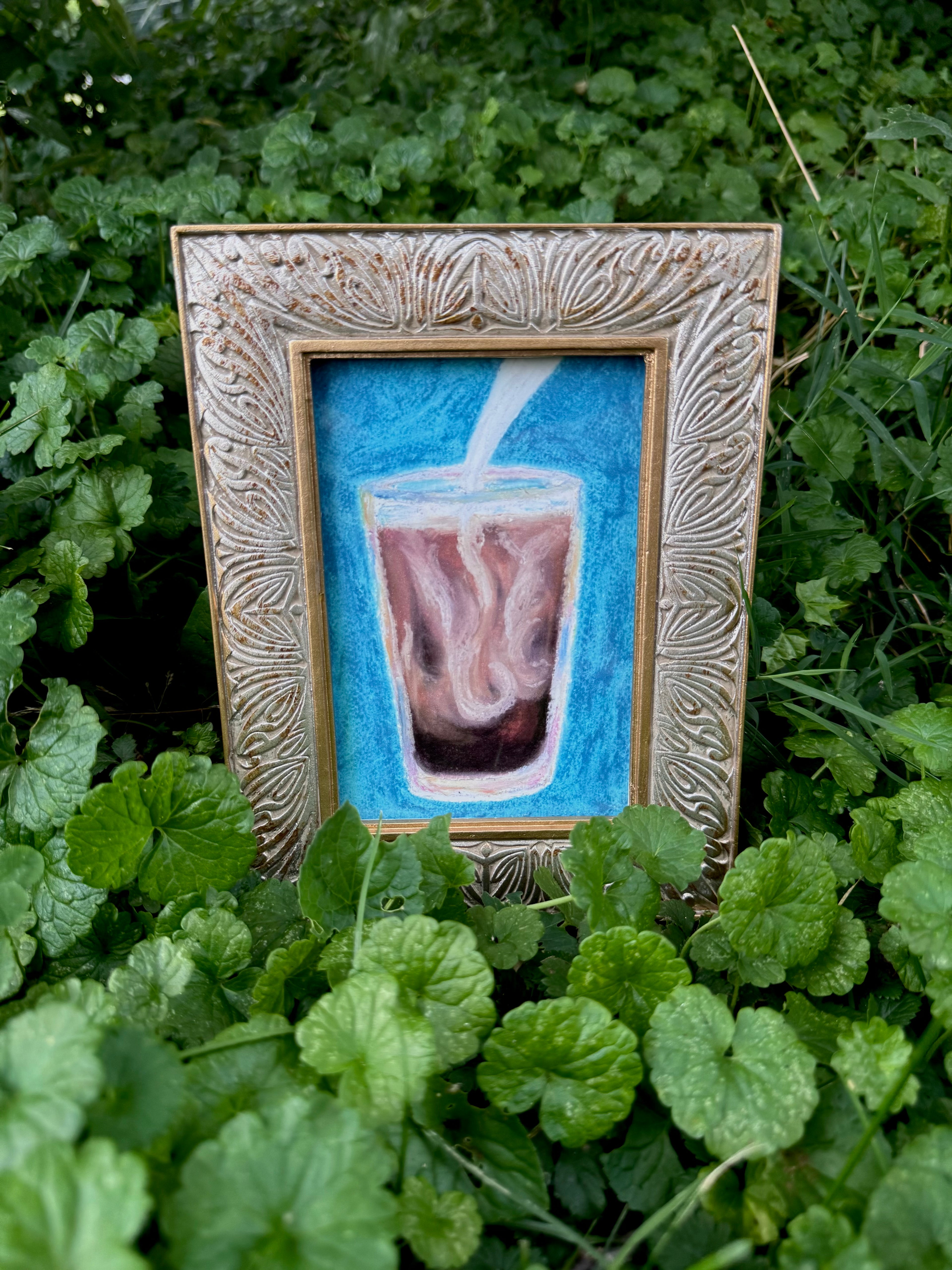 Framed iced coffee oil pastel print displayed on wall – gallery art